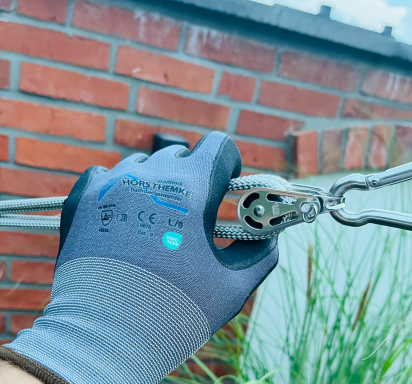 Arbeitshandschuh mit Firmenlogo - Handwerk